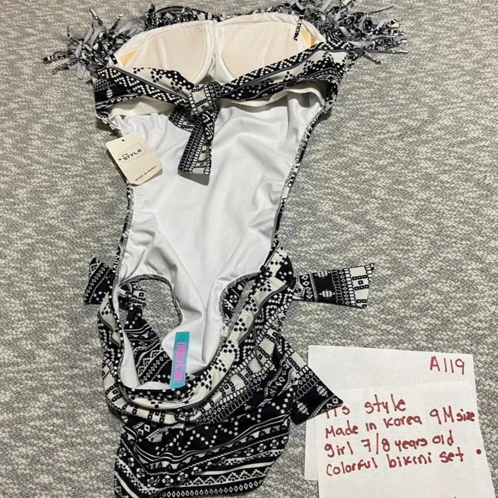 Black/White swimsuit with ruffles. Made Korea 9M=girl 7-8 years‎ old. SKU -A119